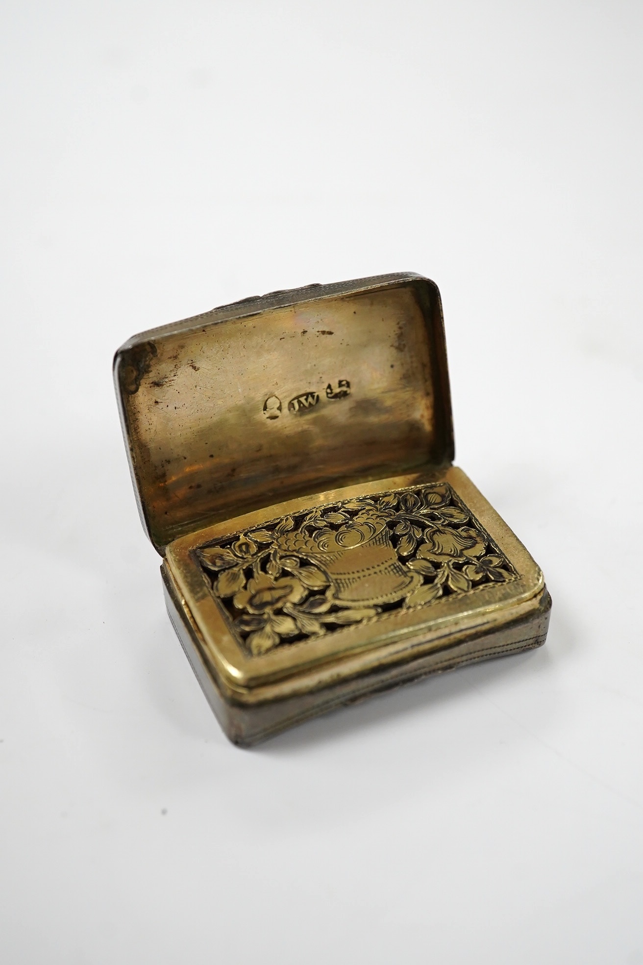 A George III silver concave vinaigrette, by Joseph Wilmore, Birmingham, 1812, 34mm, engraved 'L'Amitie'. Condition - poor to fair